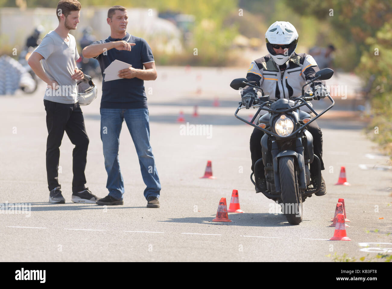 man motorcyclist passing his motorbike test Stock Photo