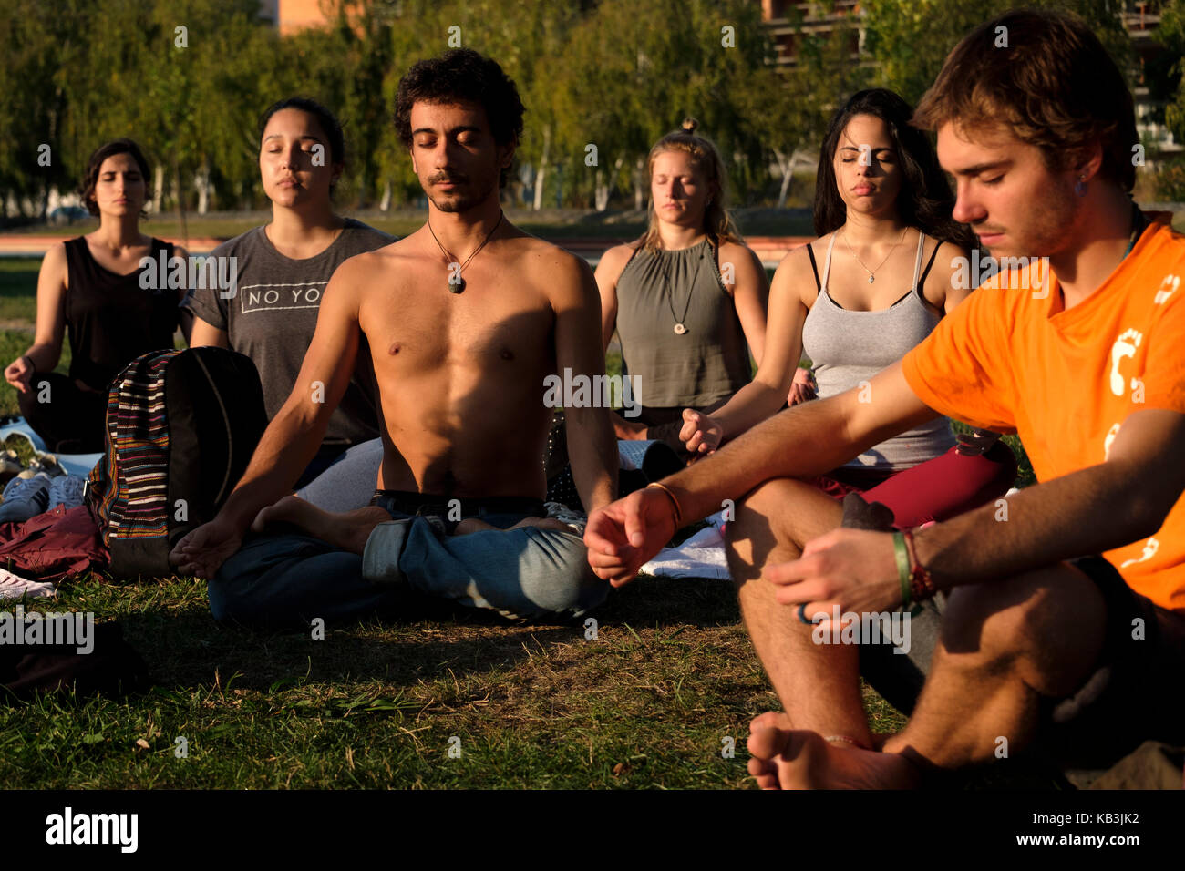 Outdoors yoga class Stock Photo