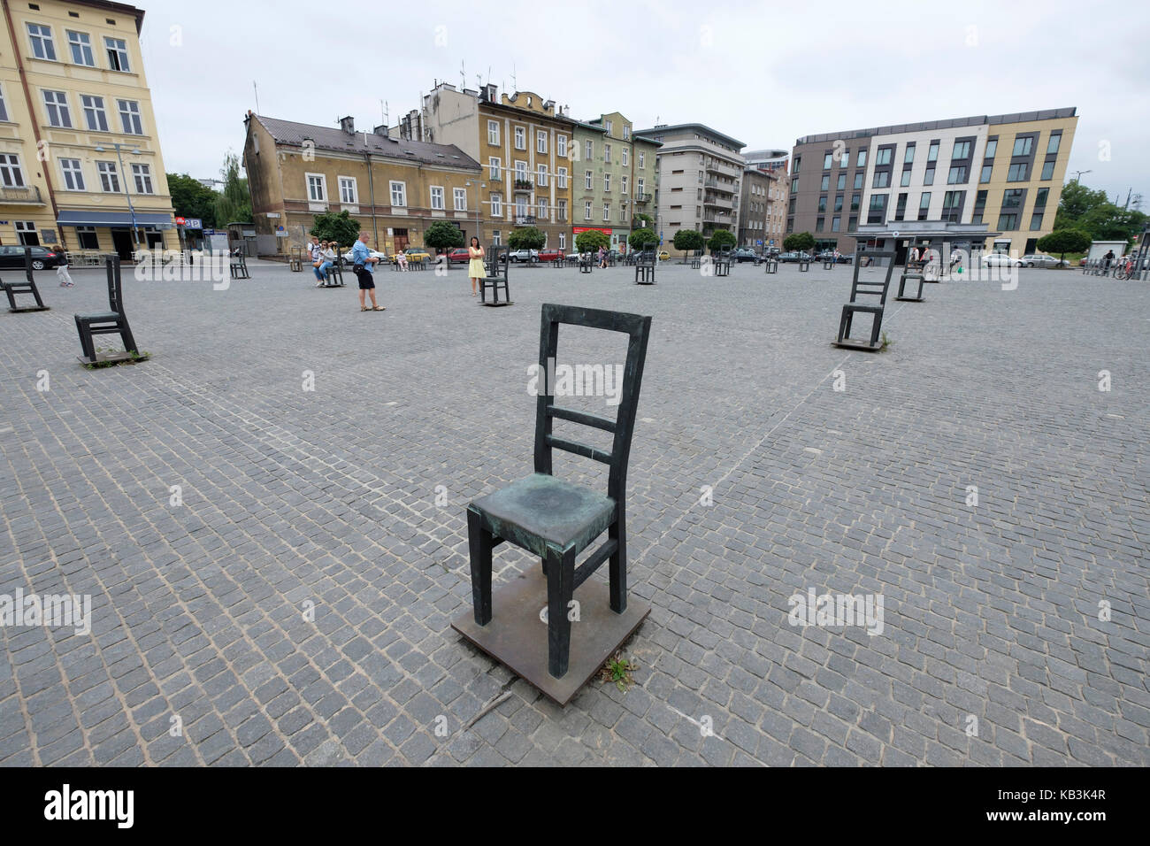 Metal chairs in memory of the jewish people killed on the Ghetto Heroes Square, Krakow, Poland, Europe Stock Photo