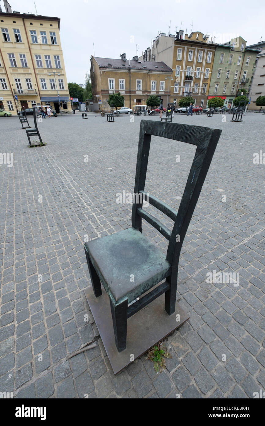 Metal chairs in memory of the jewish people killed on the Ghetto Heroes