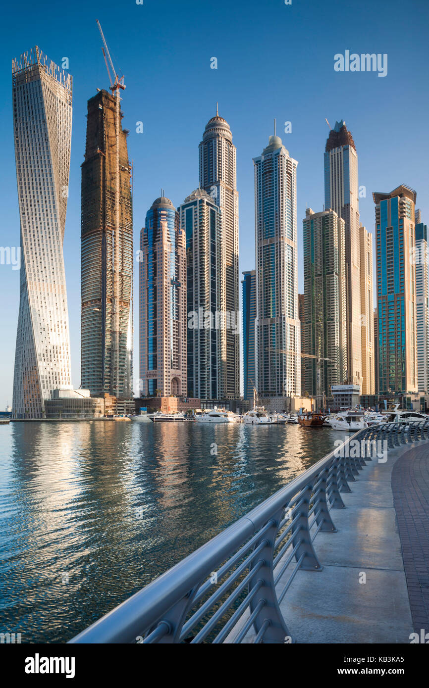 UAE, Dubai, Dubai Marina, high rise buildings including the twisted Cayan Tower, morning Stock Photo