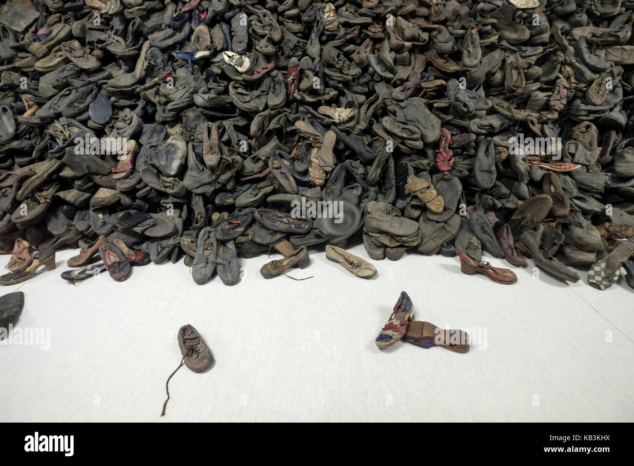 Pile of shoes belonging to prisoners at Auschwitz WWII Nazi concentration camp, Poland Stock Photo