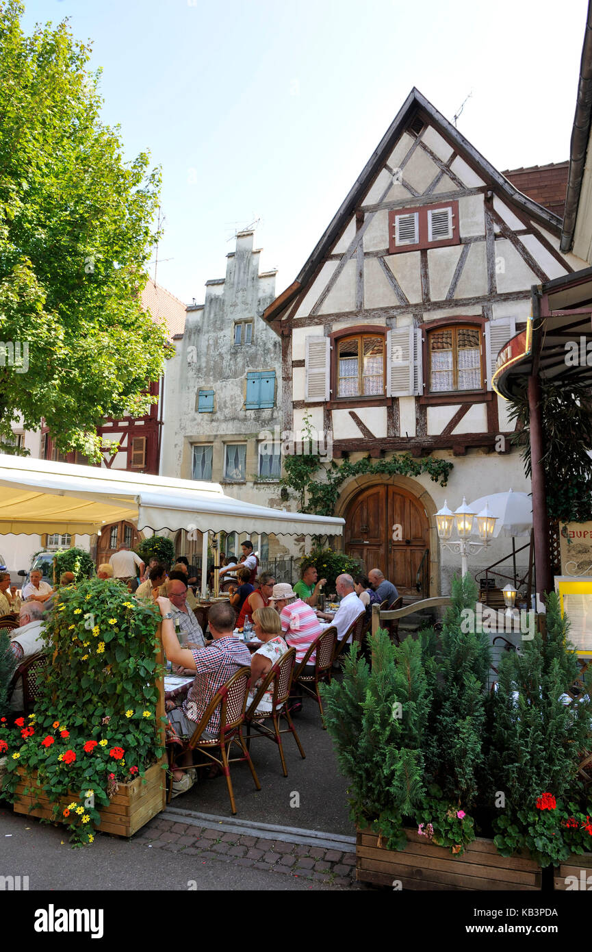 France, Haut Rhin, Alsace Wine Road, Eguisheim village, labelled Les Plus Beaux Villages de France (The Most Beautiful Villages of France), restaurant Stock Photo