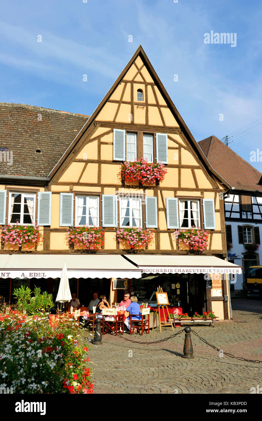 France, Haut Rhin, Alsace Wine Route, Eguisheim, labelled Les Plus Beaux Villages de France (The Most Beautiful Villages of France), Castle square, restaurant Stock Photo