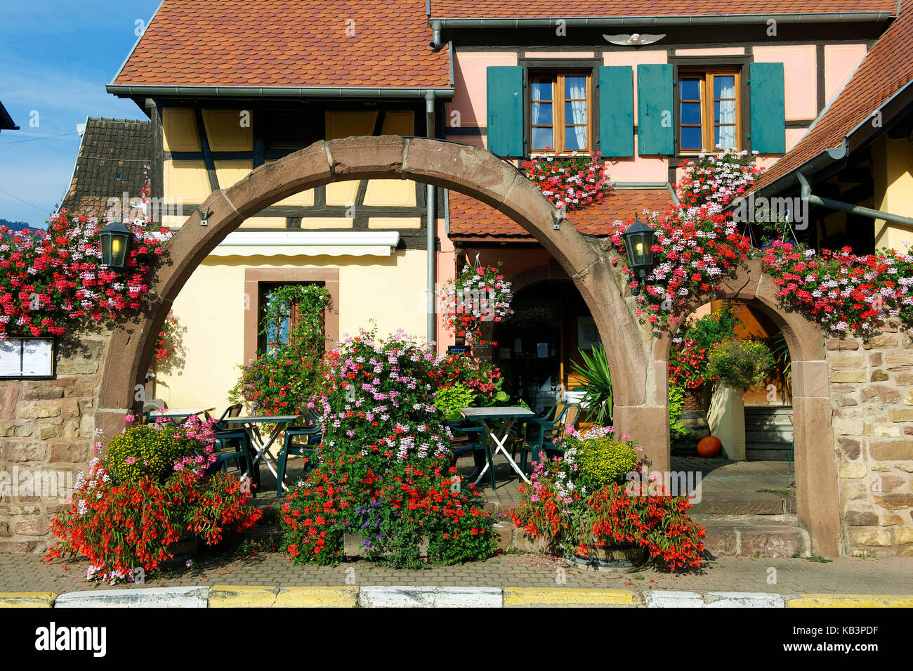 France, Haut Rhin, Alsace Wine Road, Eguisheim village, labelled Les Plus Beaux Villages de France (The Most Beautiful Villages of France), restaurant Stock Photo