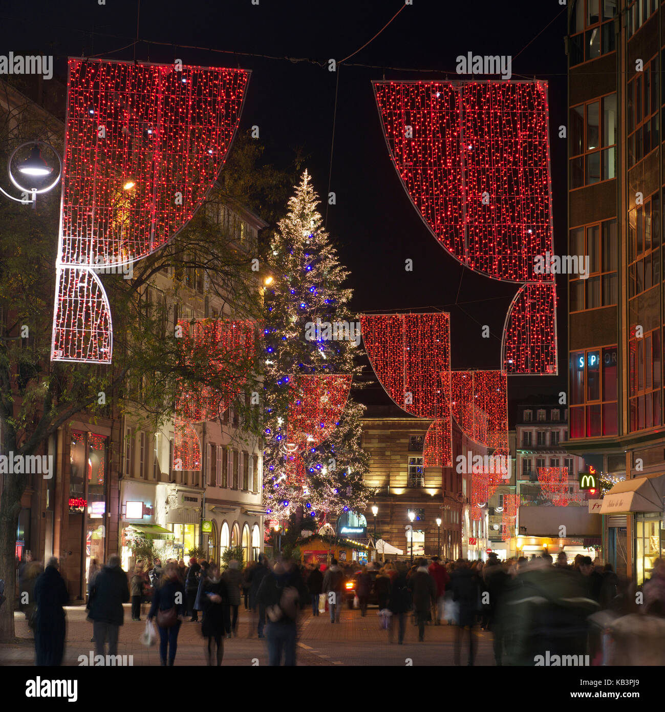 France, Bas Rhin, Strasbourg, old town listed as World Heritage by UNESCO, the big Christmas Tree of the Place Kleber with the lighting of the Rue des Grandes Arcades Stock Photo