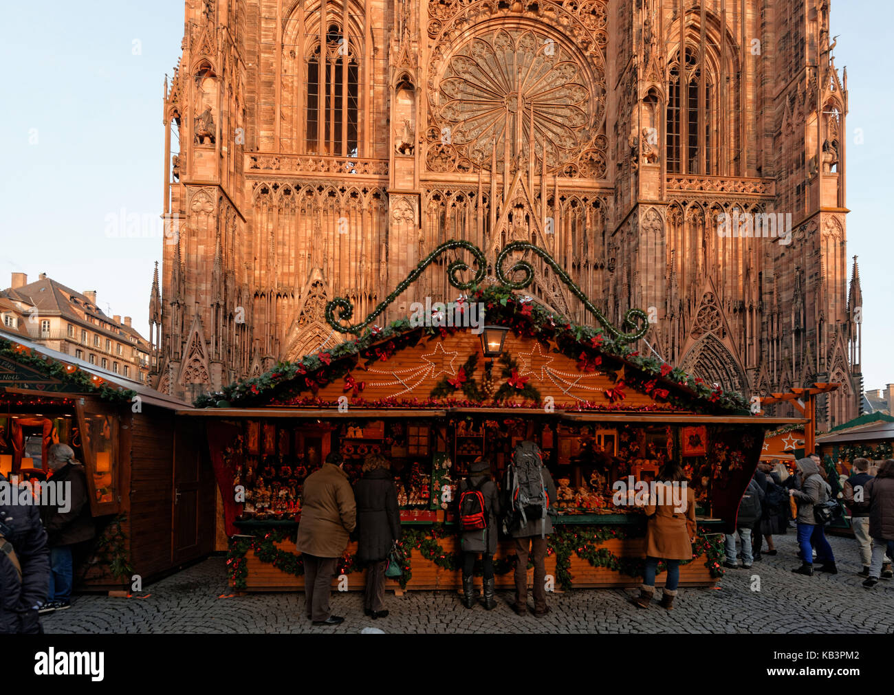 France, Bas Rhin, Strasbourg, old town listed as World Heritage by UNESCO, Christmas market (Christkindelsmarik), place de la Cathedrale with Notre Dame Cathedral Stock Photo