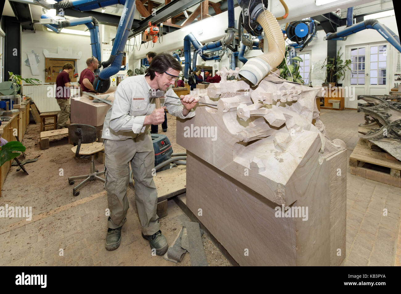 France, Bas Rhin, Strasbourg, old town listed as World Heritage by UNESCO, A stone cutter in the workshop of the Oeuvre Notre Dame Stock Photo