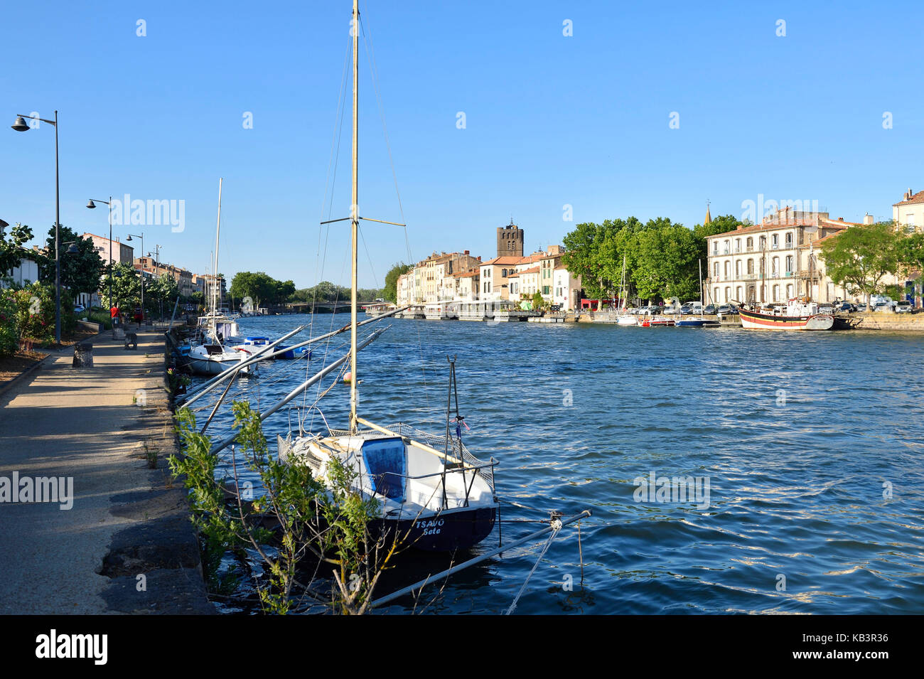 France, Herault, Agde, Herault river banks and St Etienne cathedral Stock Photo