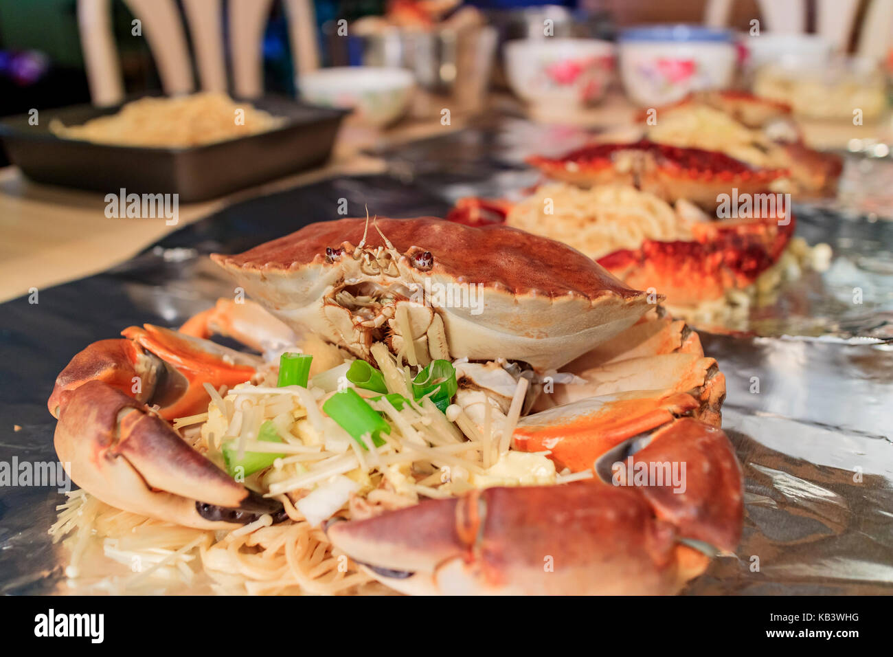 Stone crab prepared in aluminum foil with noodle at home, Los Angeles