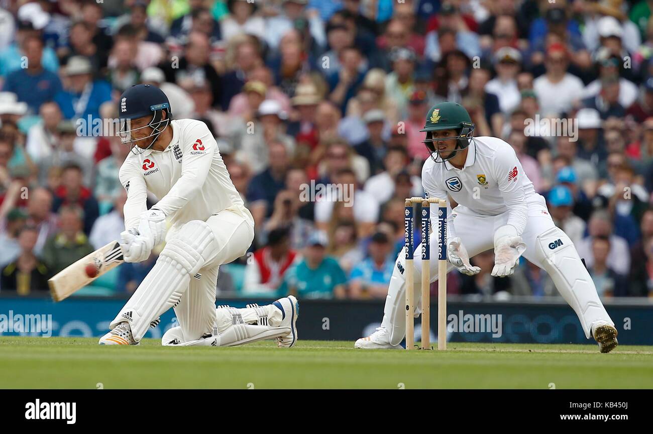 Jonny Bairstow of England sweeps during day four of the third Investec Test match between England and South Africa at The Oval in London. 30 Jul 2017 Stock Photo