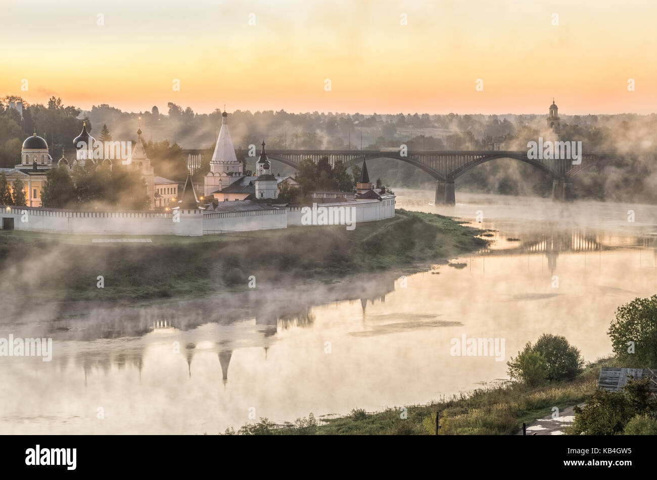 Misty morning over Volga river and monastery in Staritsa, Tver oblast, Russia Stock Photo