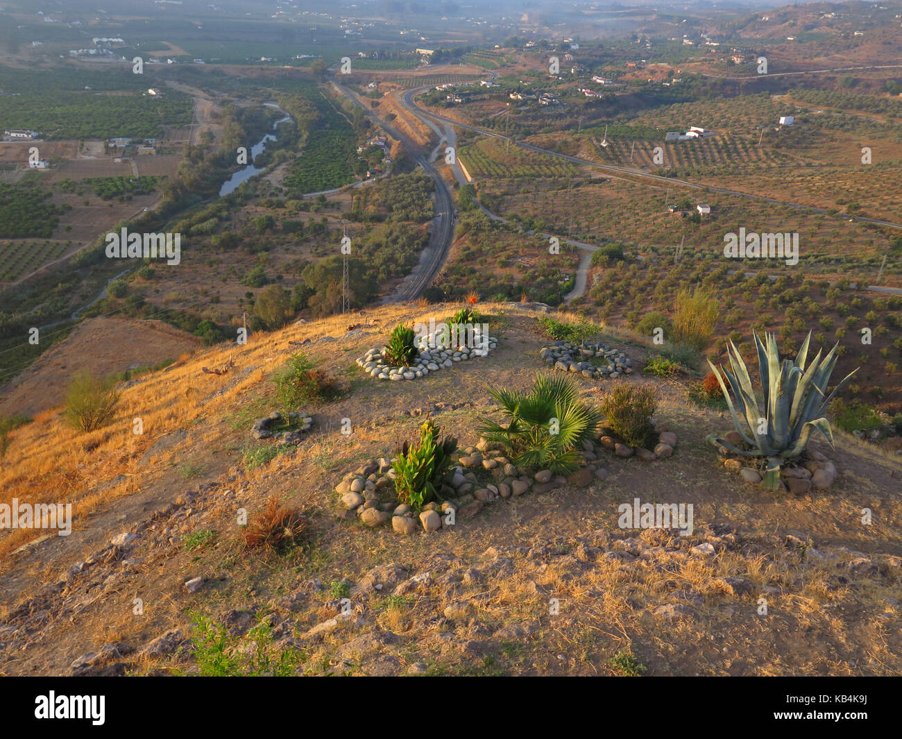 Flowerbed and rockery in Small hilltop garden Stock Photo - Alamy