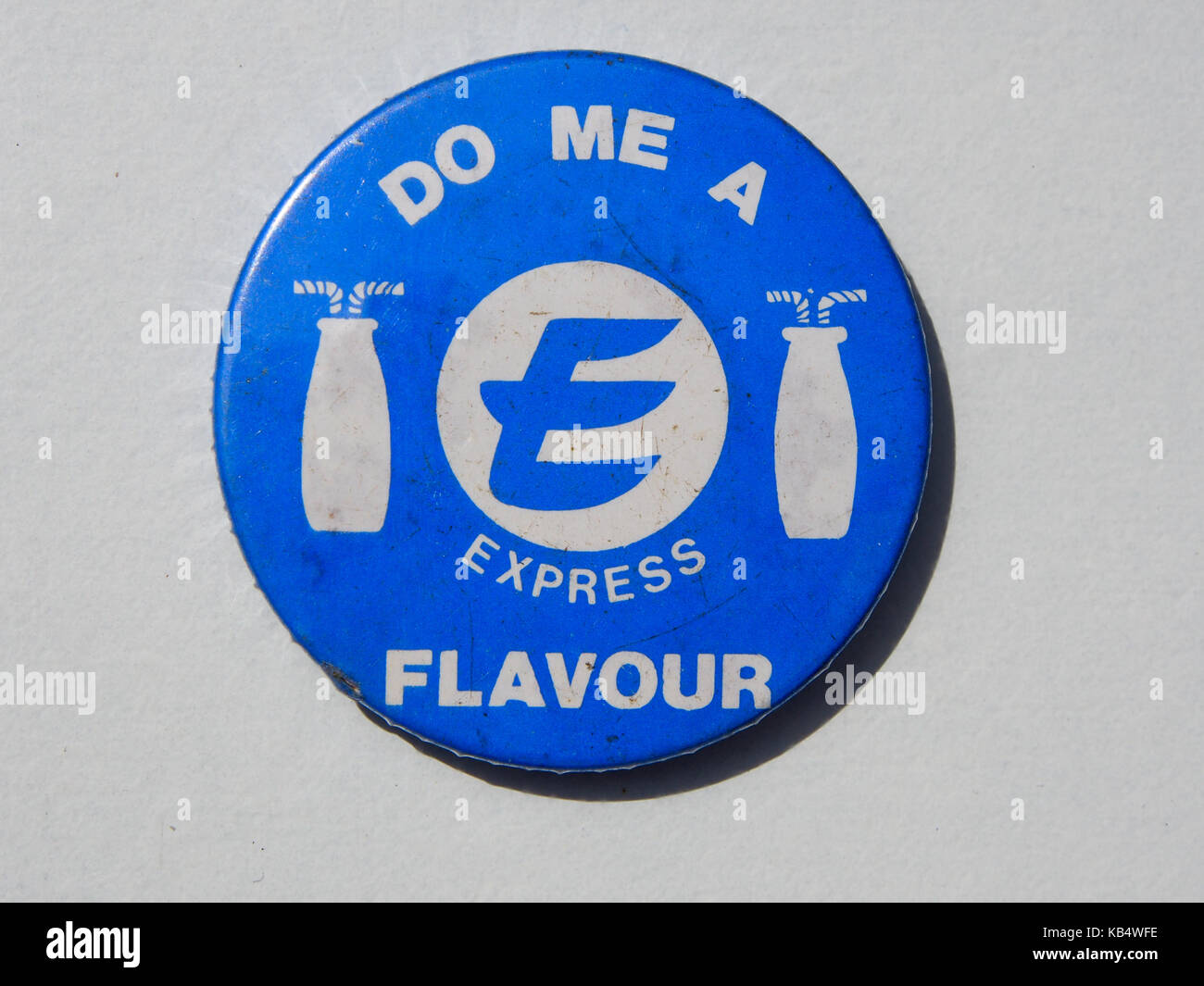 e express dairy button pin badge dated from the 1980's Stock Photo Alamy