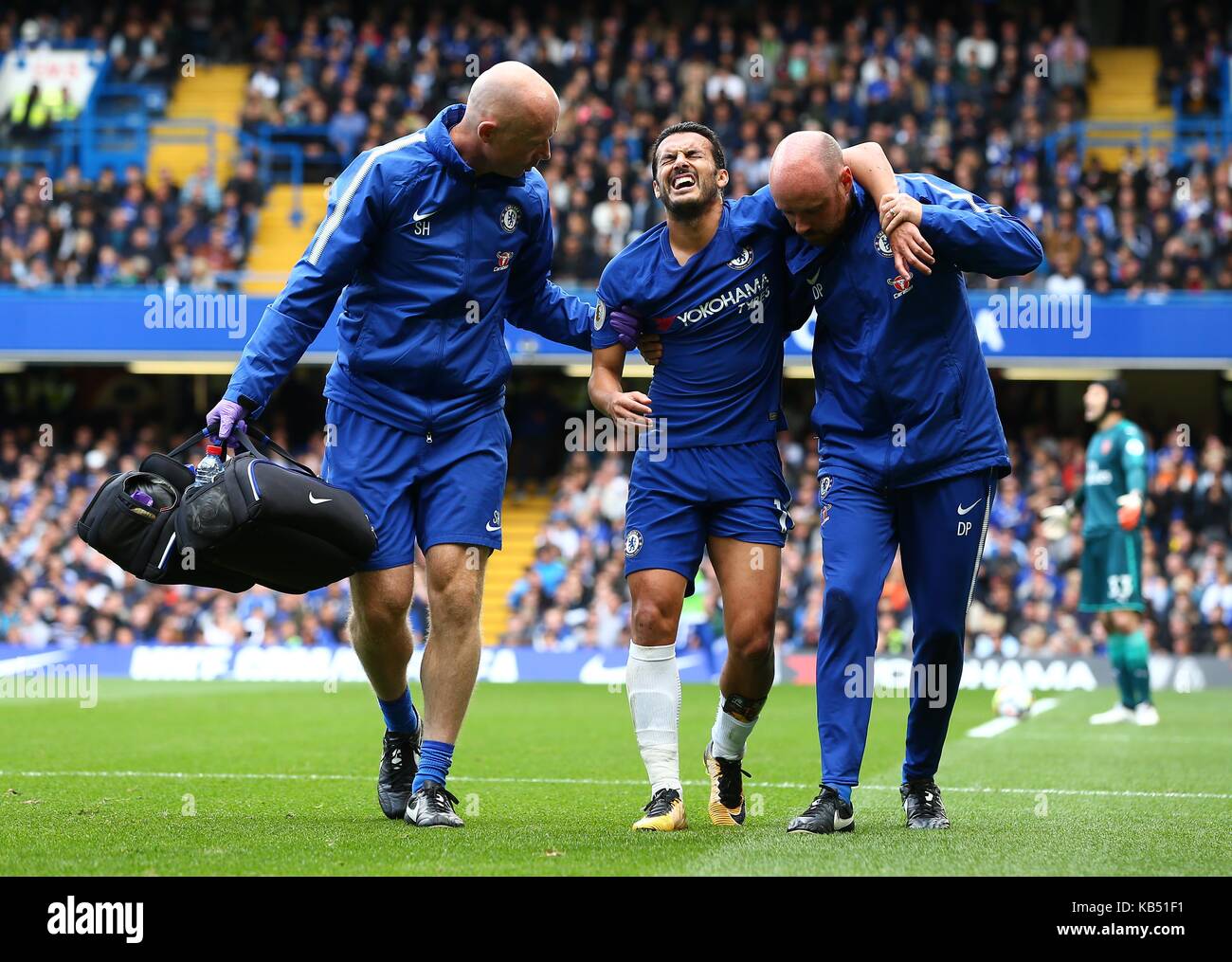 Pedro of Chelsea grimaces in pain during the Premier League match between Chelsea and Arsenal at Stamford Bridge in London. 17 Sep 2017 Stock Photo