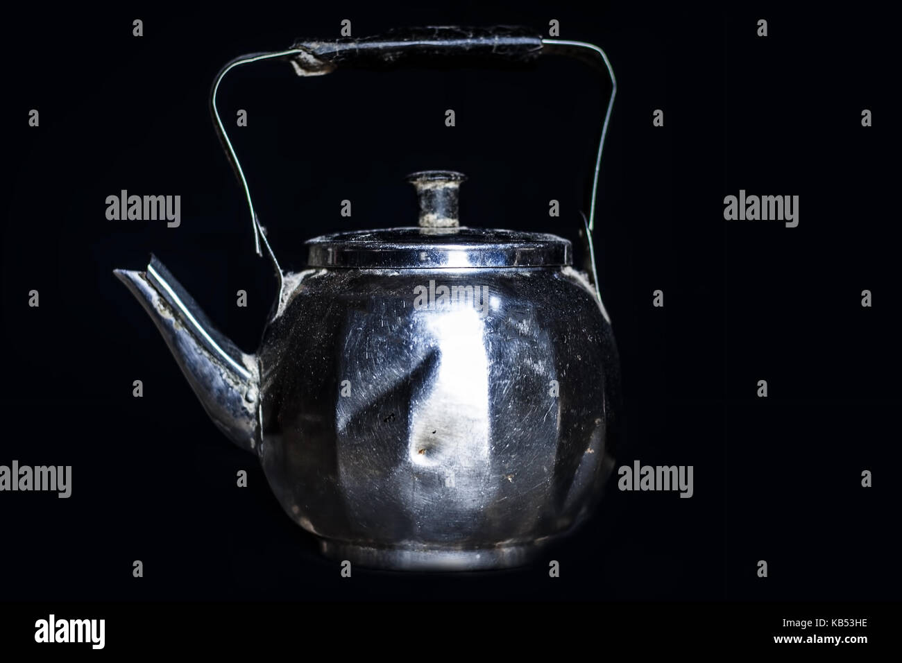 https://c8.alamy.com/comp/KB53HE/steel-teapot-isolated-on-black-KB53HE.jpg