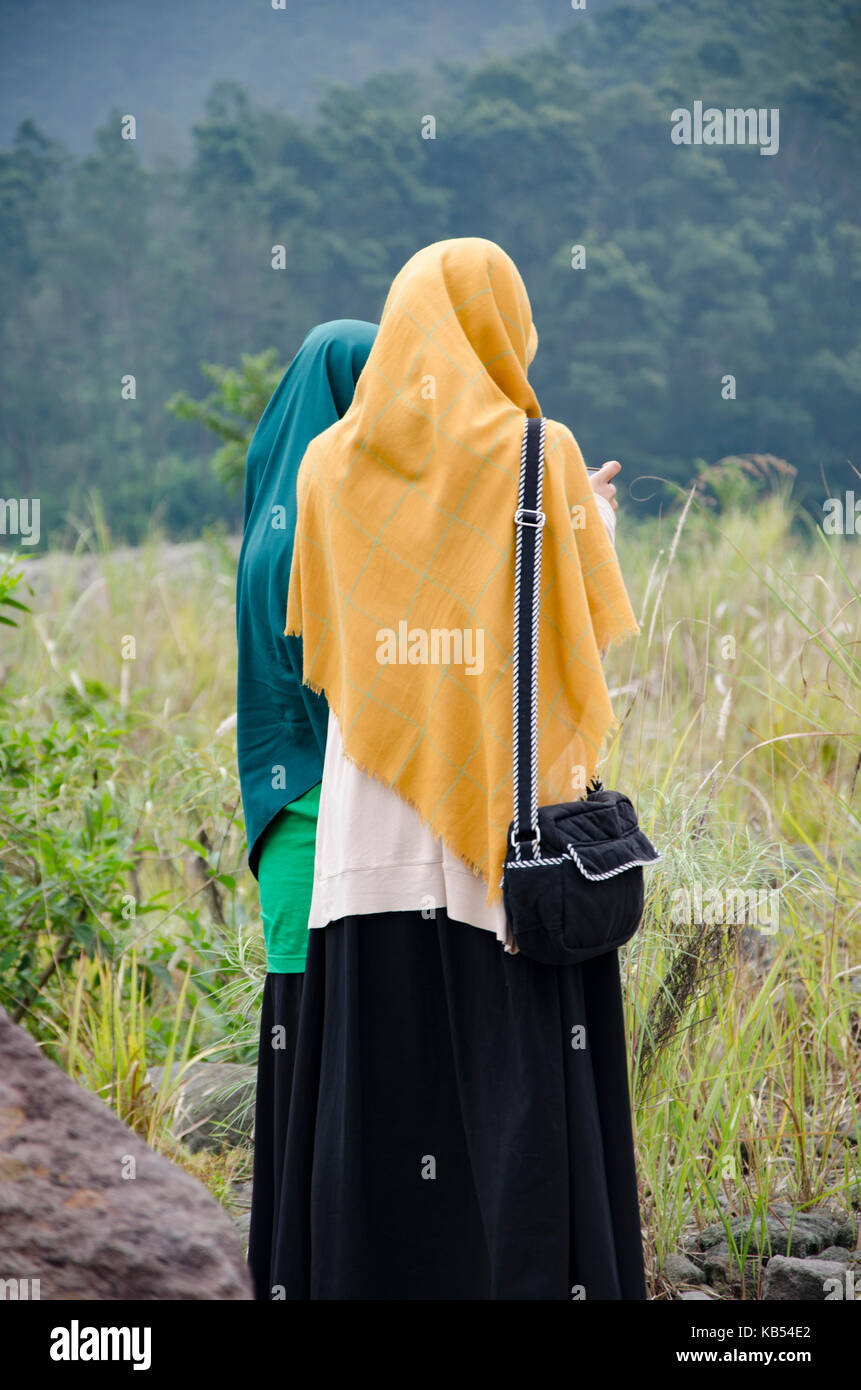 Indonesian muslim women wearing head scarf Stock Photo