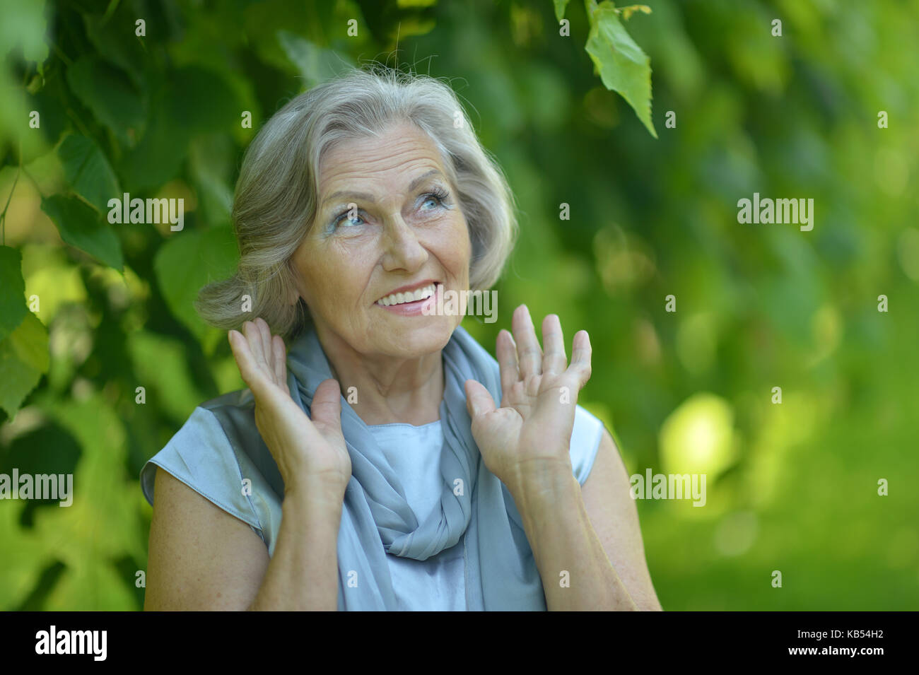 woman posing in summer park  Stock Photo