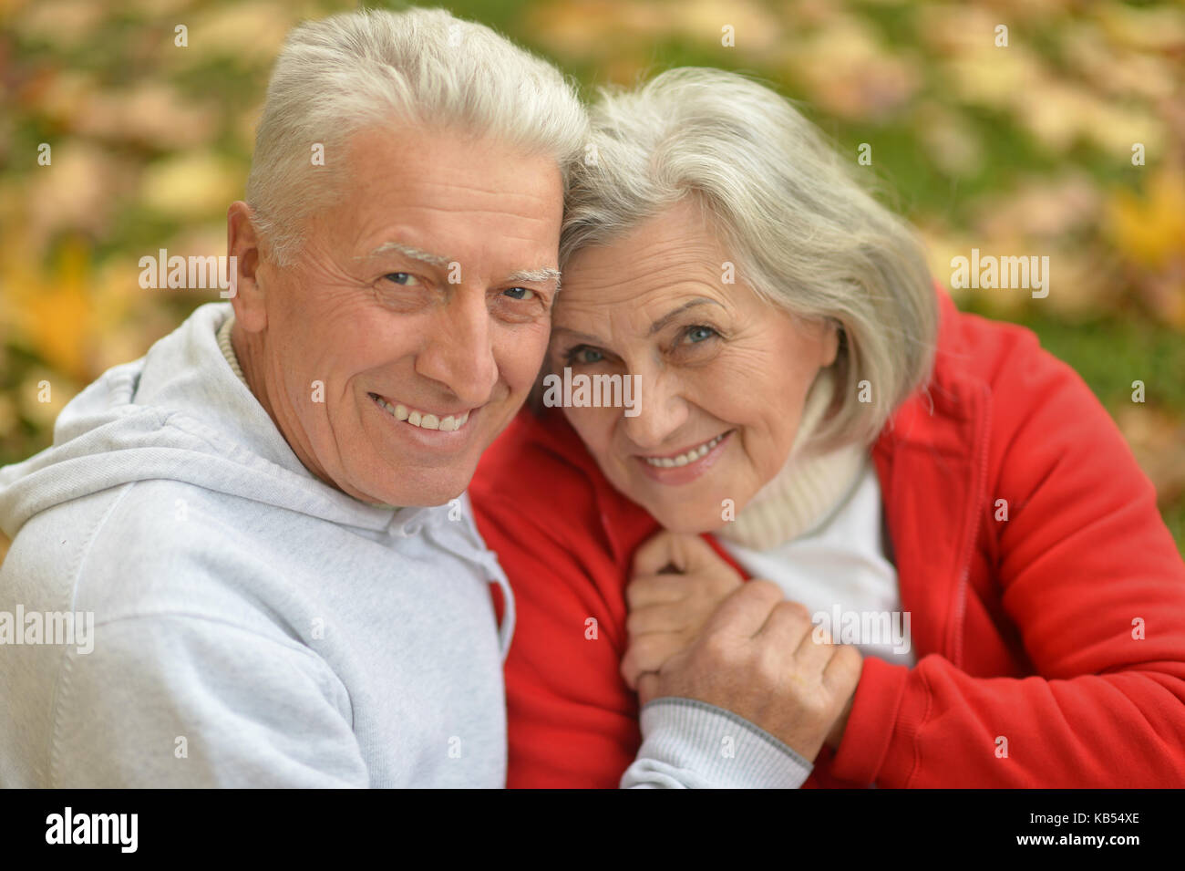 caucasian senior couple in the park Stock Photo - Alamy