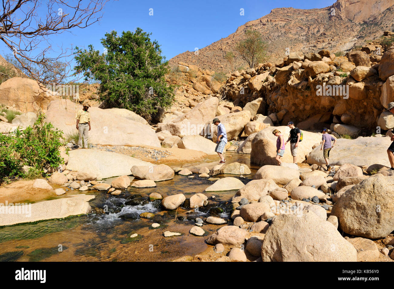 Namibia, Erongo, Damaraland, Brandberg, Tourists visiting Tsisab Ravine Valley Stock Photo