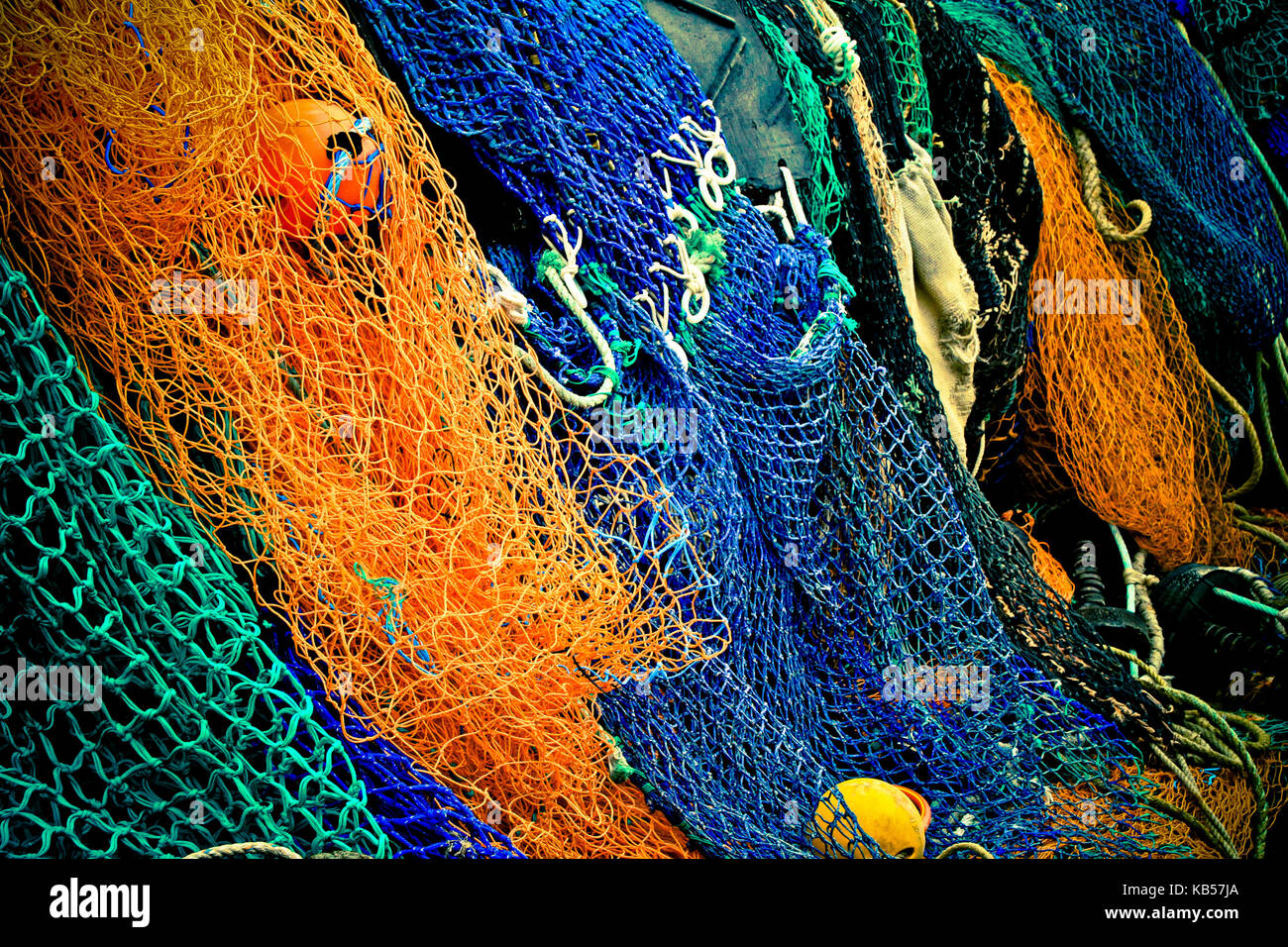 Coloured fishing nets on the shore Stock Photo Alamy