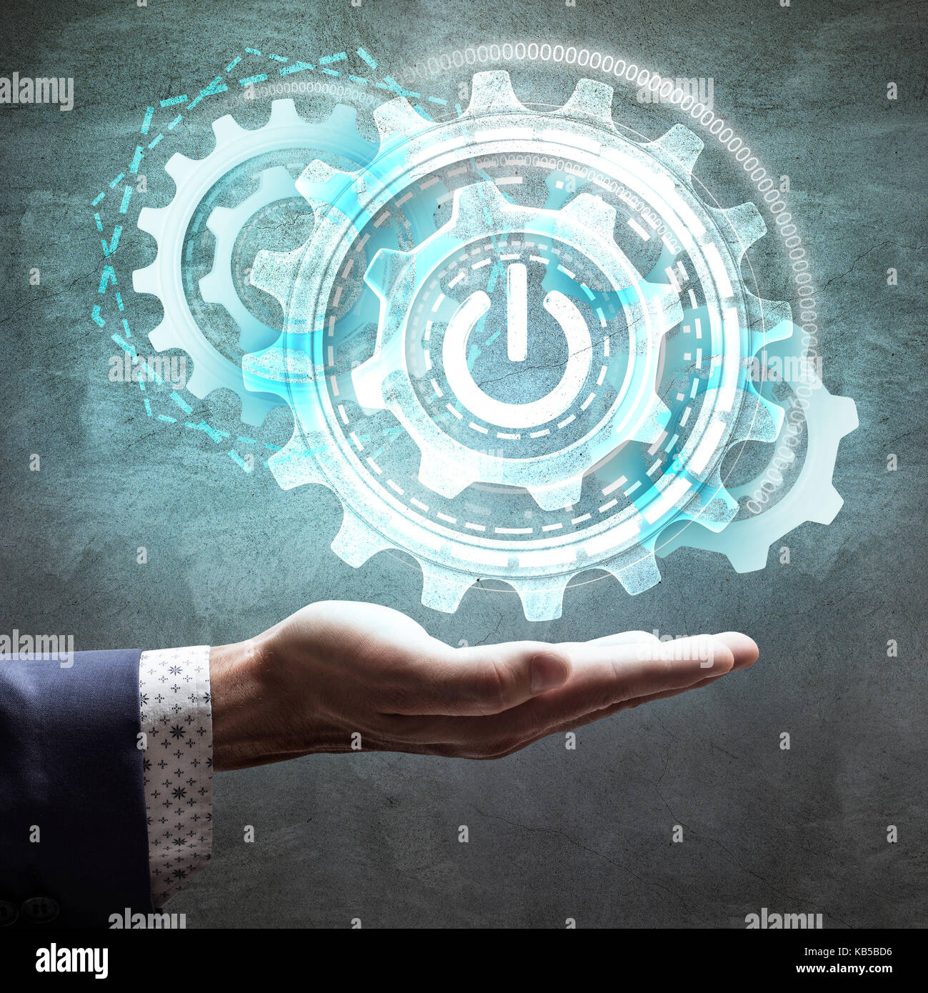 Businessman pressing on group of gears Stock Photo Alamy