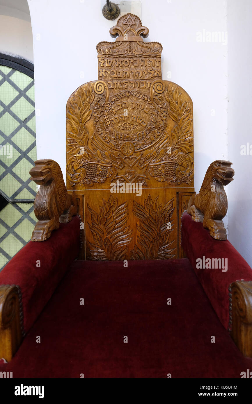 Decorated wooden chair for circumcision ceremony designated "the chair