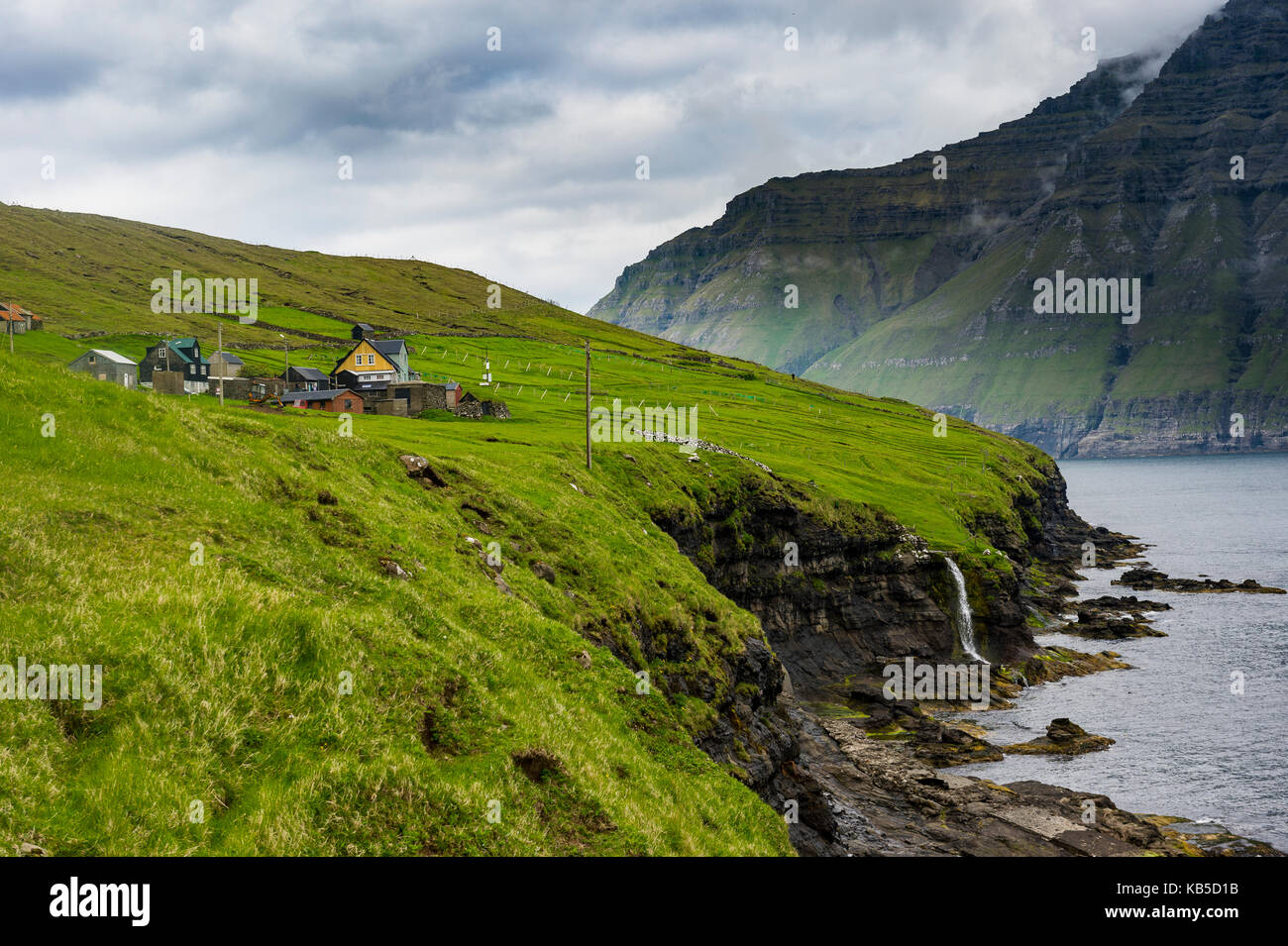 Waterfall into the ocean, Bordoy, Faroe Islands, Denmark, Europe Stock Photo