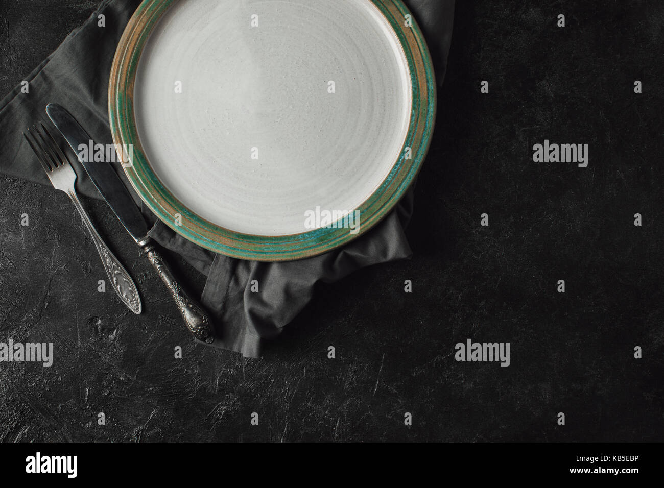 silverware and plate on linen Stock Photo Alamy