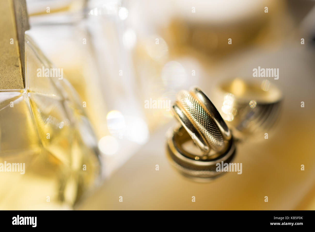 precious family jewellery on glass background Stock Photo