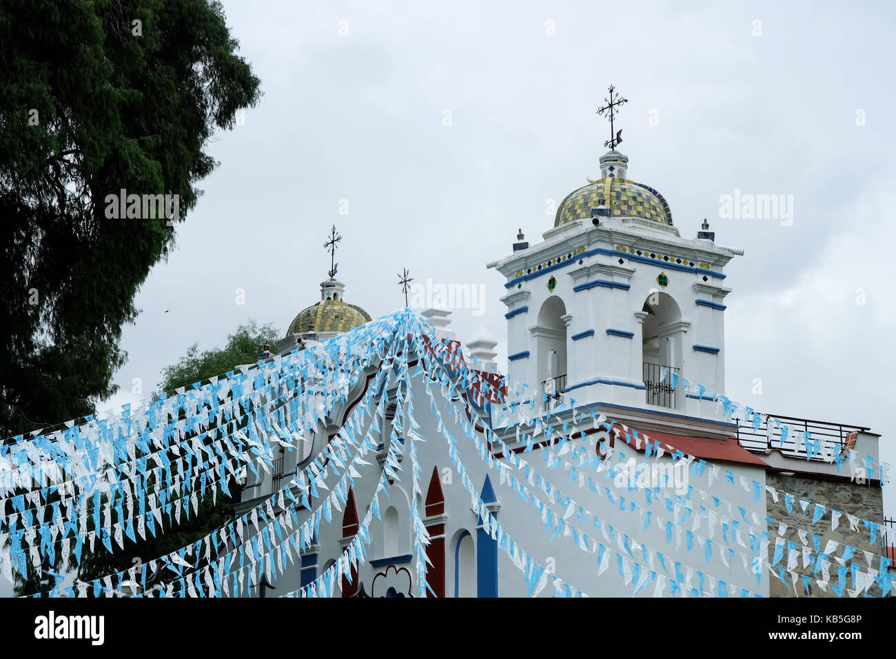 The Santa Mar’a de la Asunci—n which sits next to the Arbol Del Tule in Santa Maria el Tule, Oaxaca, Mexico. Stock Photo