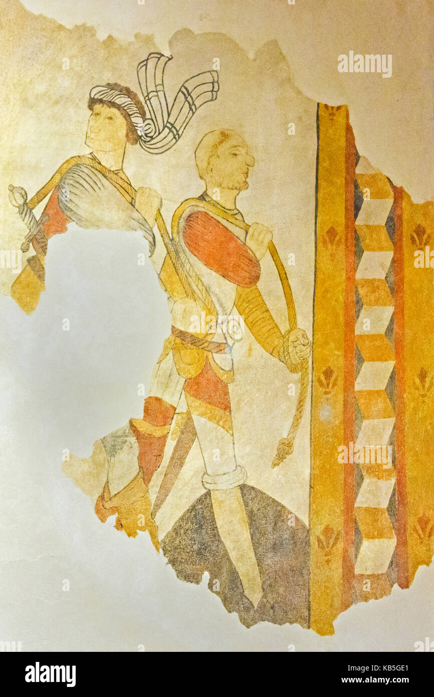 A 15th century fresco of armed men in St. Eutrope church, River Dropt, Allemans-du-Dropt, Lot-et-Garonne, France Stock Photo