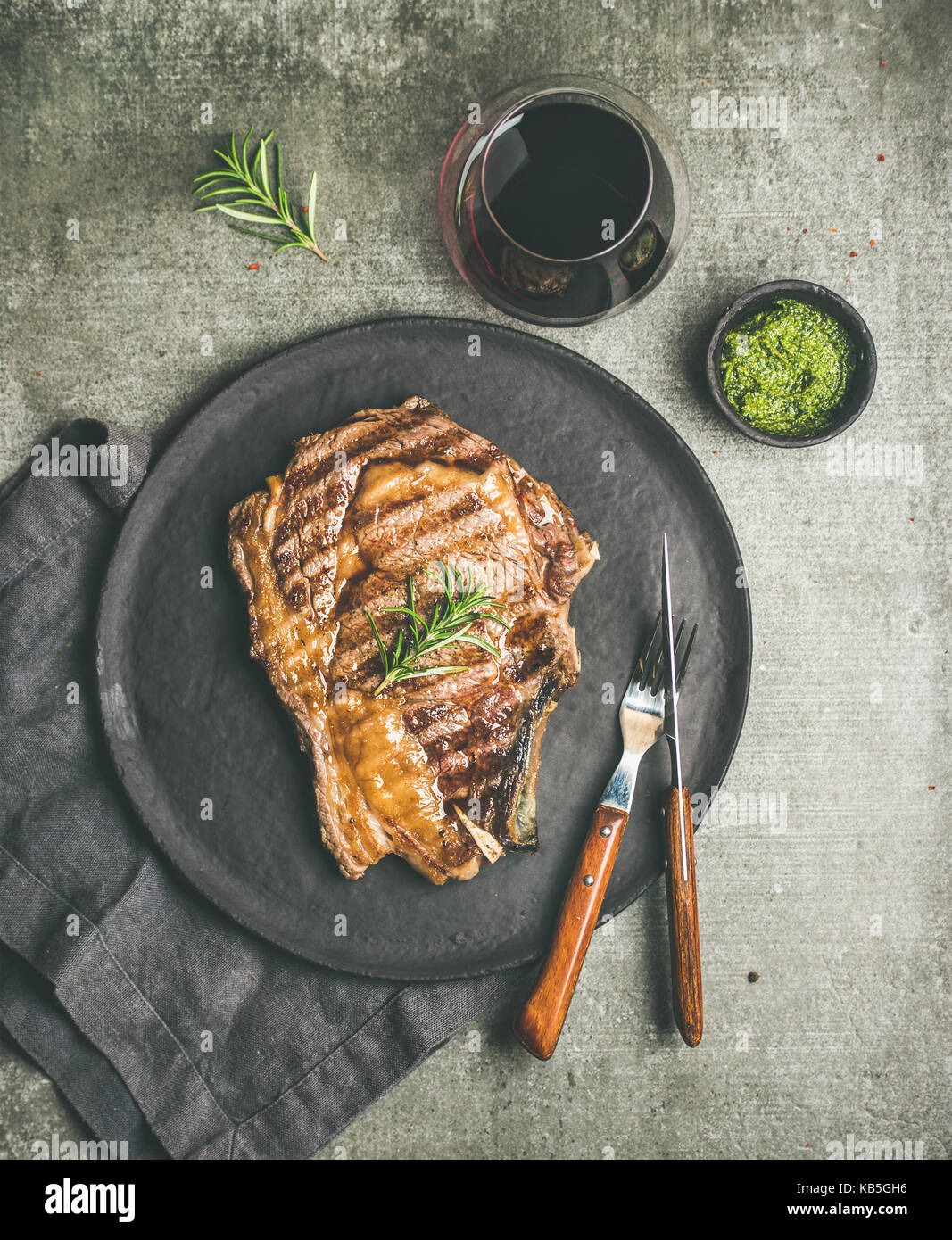 Flatlay of Grilled hot ribeye beef steak on bone Stock Photo Alamy