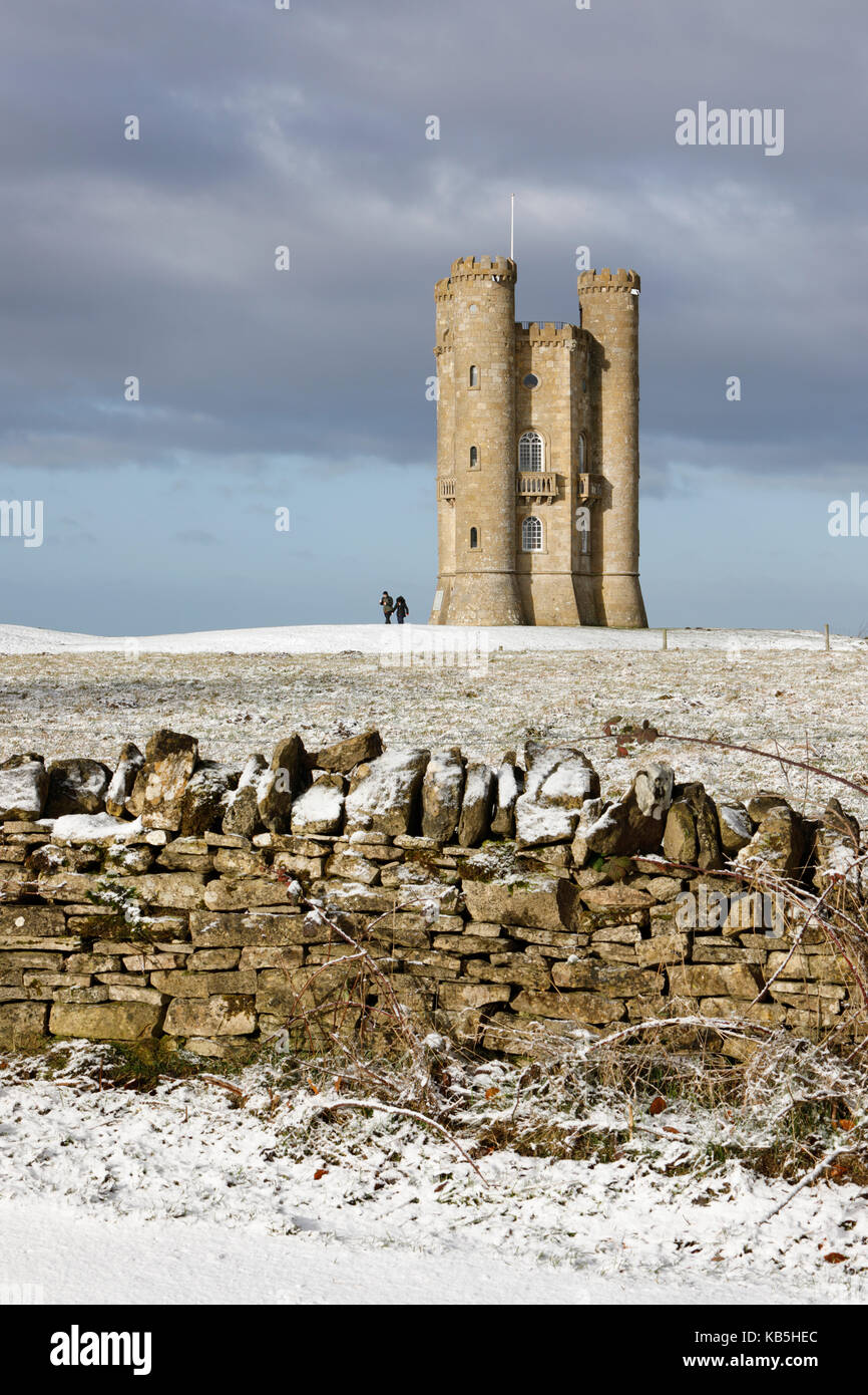 Broadway Tower and Cotswold drystone wall in snow, Broadway, Cotswolds