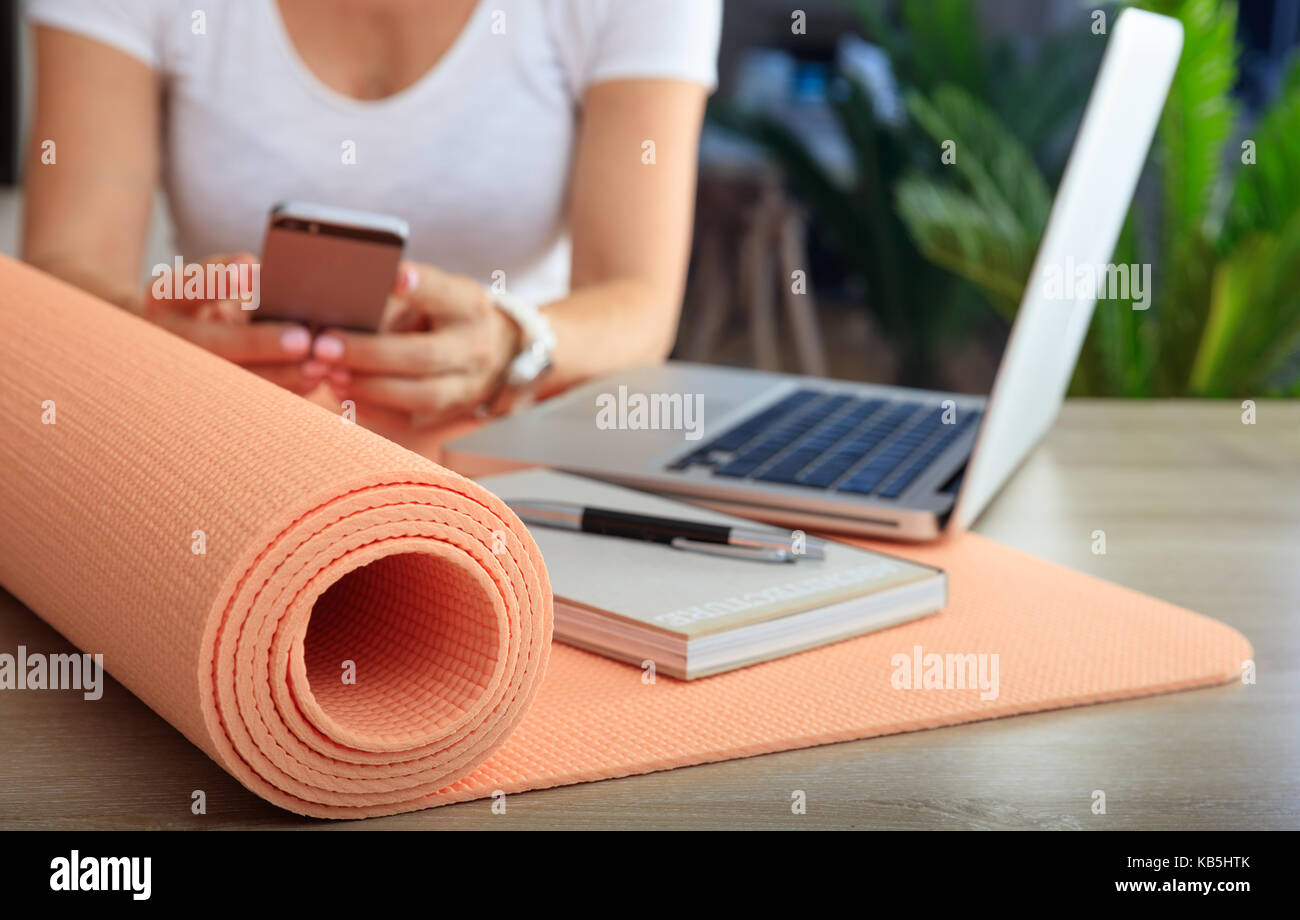 Relax At Work Concept Yoga Mat In An Office Desk Stock Photo