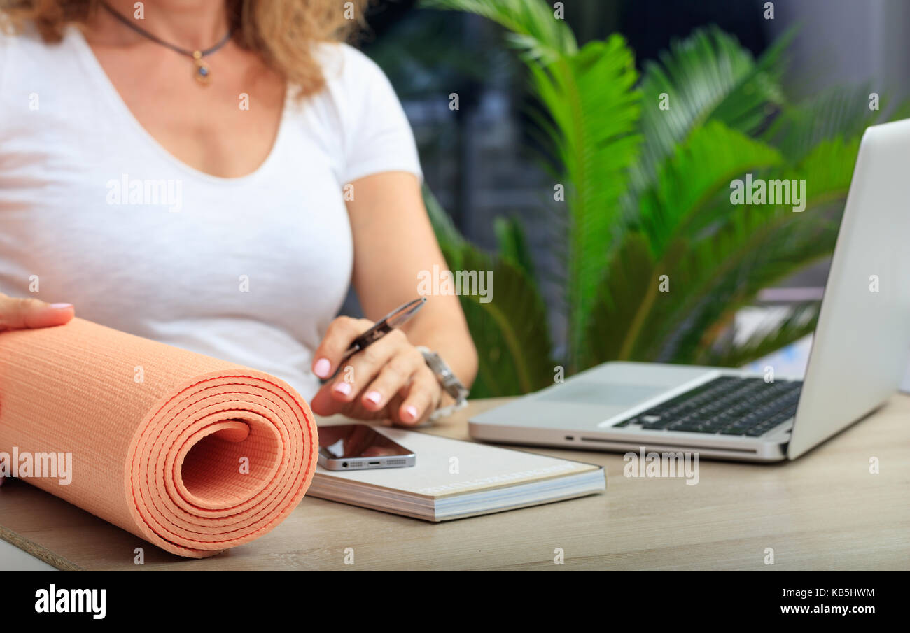 Relax At Work Concept Yoga Mat In An Office Desk Stock Photo
