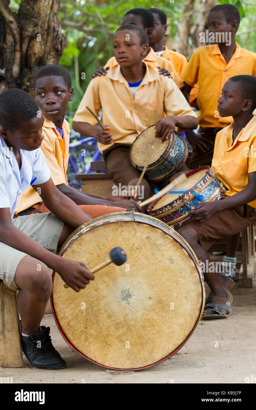 A group of young men playing the drums in Ghana, West Africa, Africa