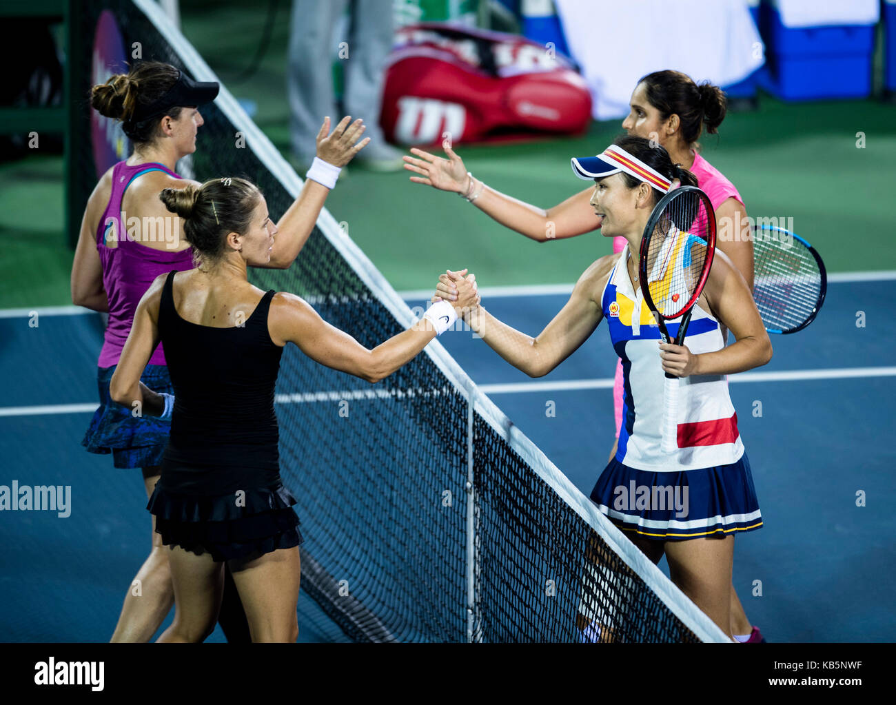 Wuhan, China. 28th Sep, 2017. Peng Shuai (2nd R) of China and Sania