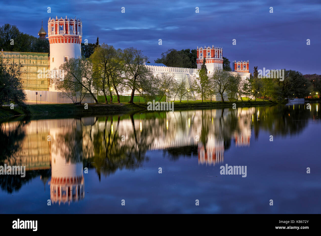 Outer wall of the Novodevichy Convent illuminated at night. Moscow, Russia. Stock Photo