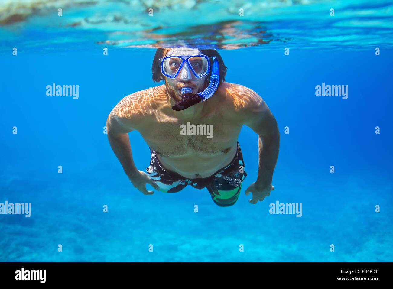 Underwater shoot of a young man snorkeling in a tropical sea. vacation concept Stock Photo