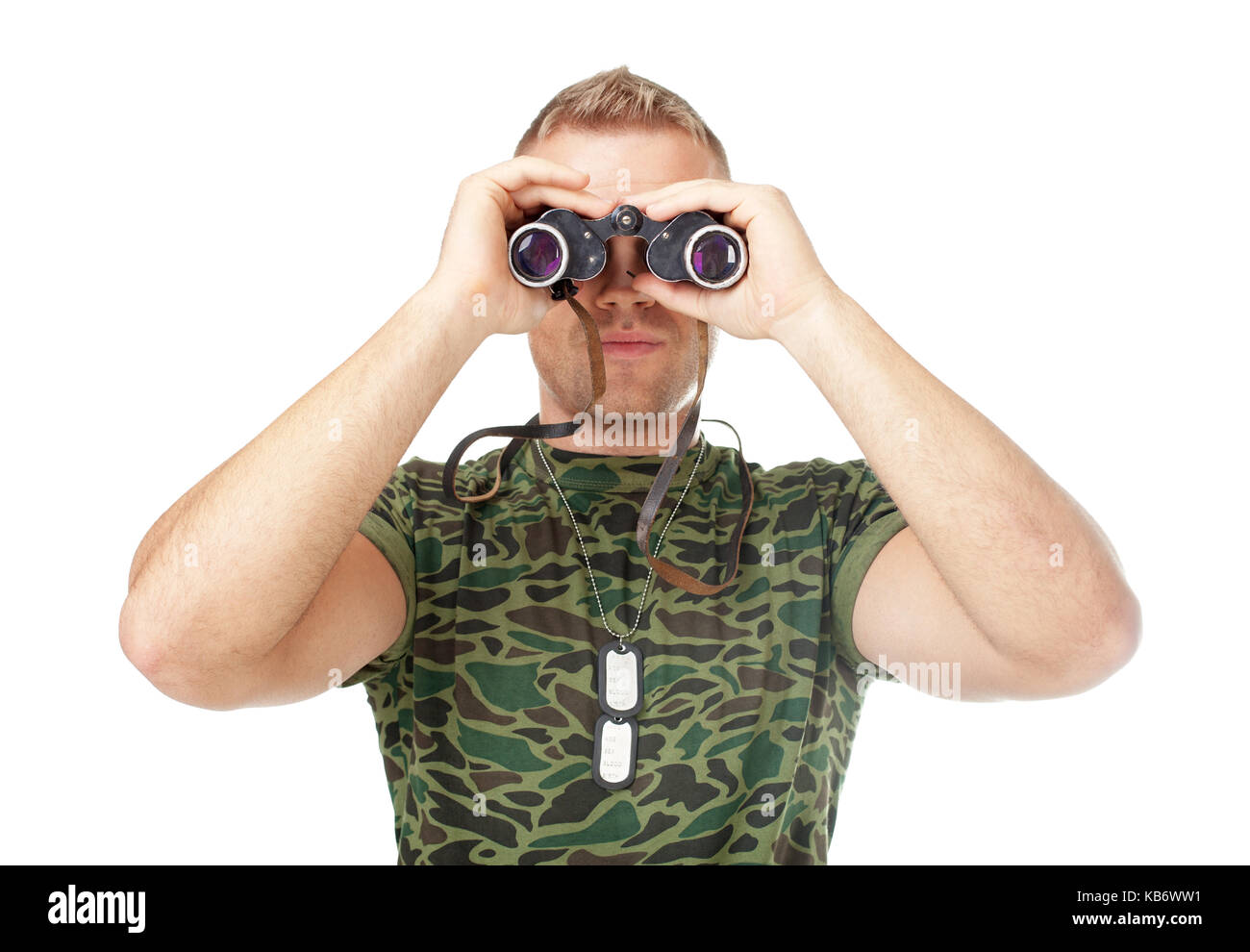 Young army soldier looking through binoculars isolated on white background Stock Photo