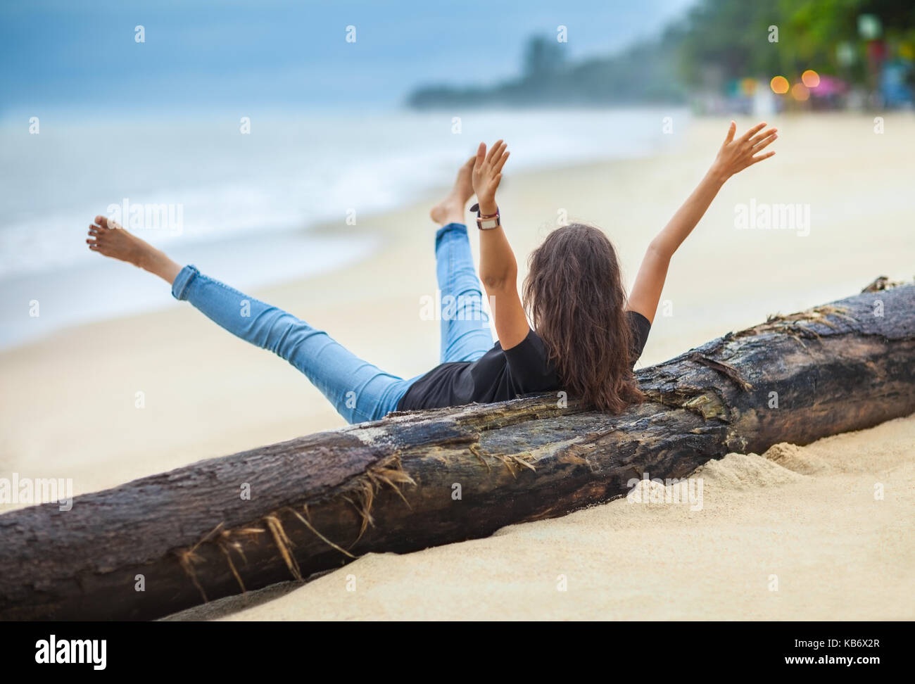 Woman lying on back legs up hires stock photography and images Alamy