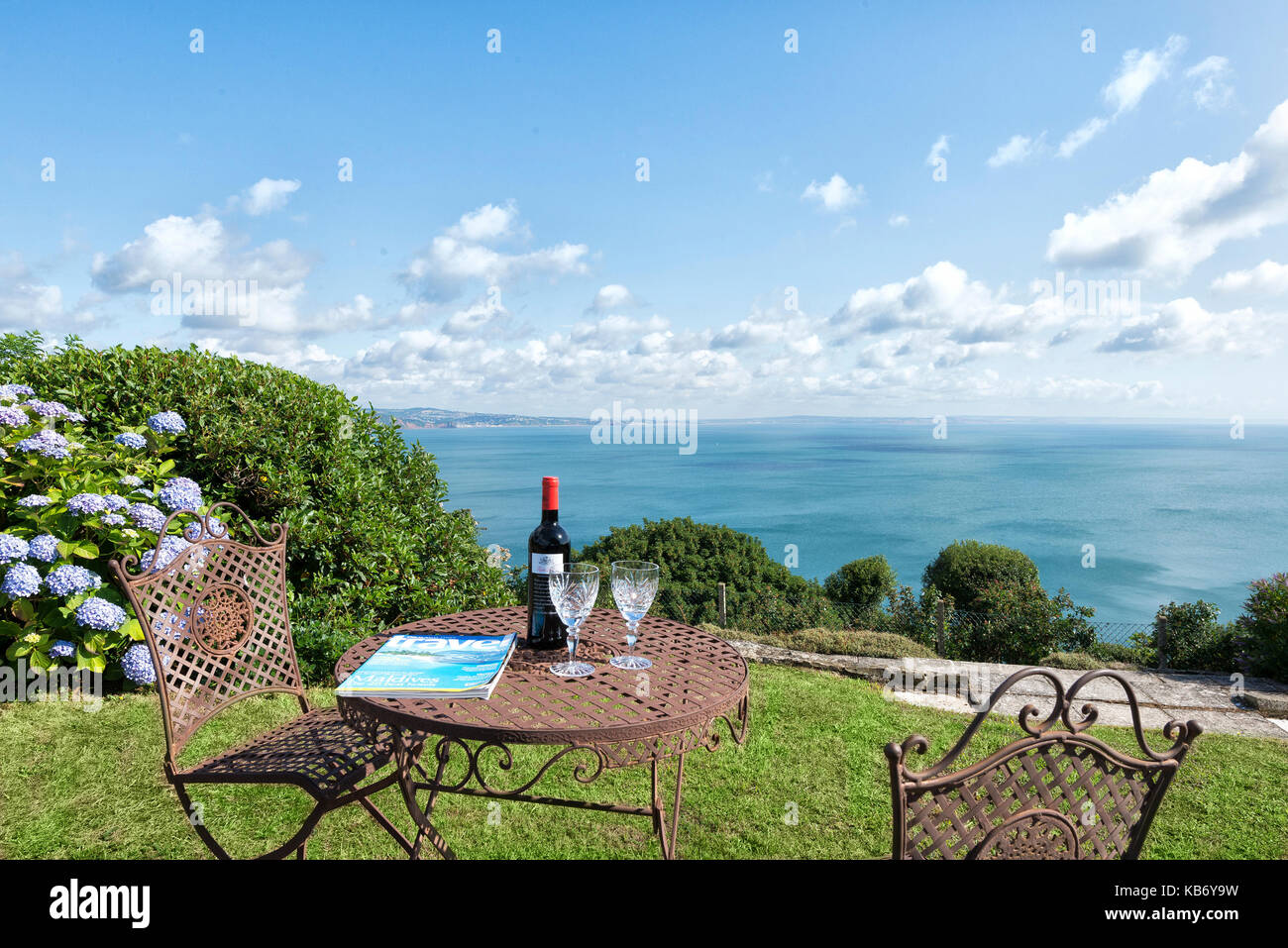 Two red garden chairs hi-res stock photography and images - Alamy