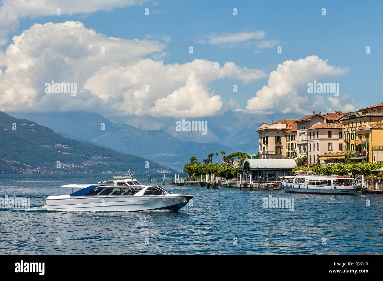 Boat on Lake Como near beautiful town Bellagio in Italy. European vacation Stock Photo