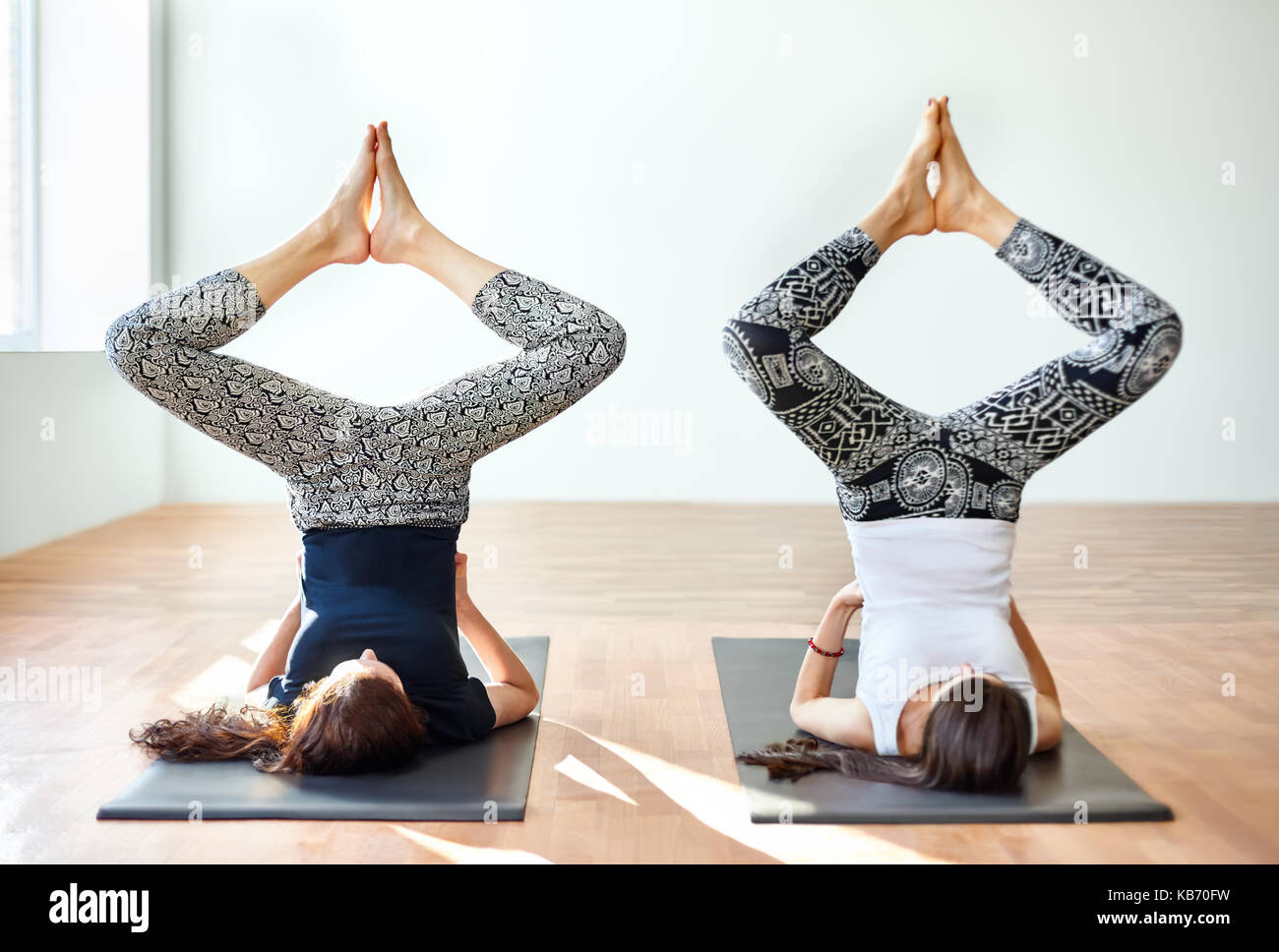 Bound angle headstand pose hires stock photography and images Alamy