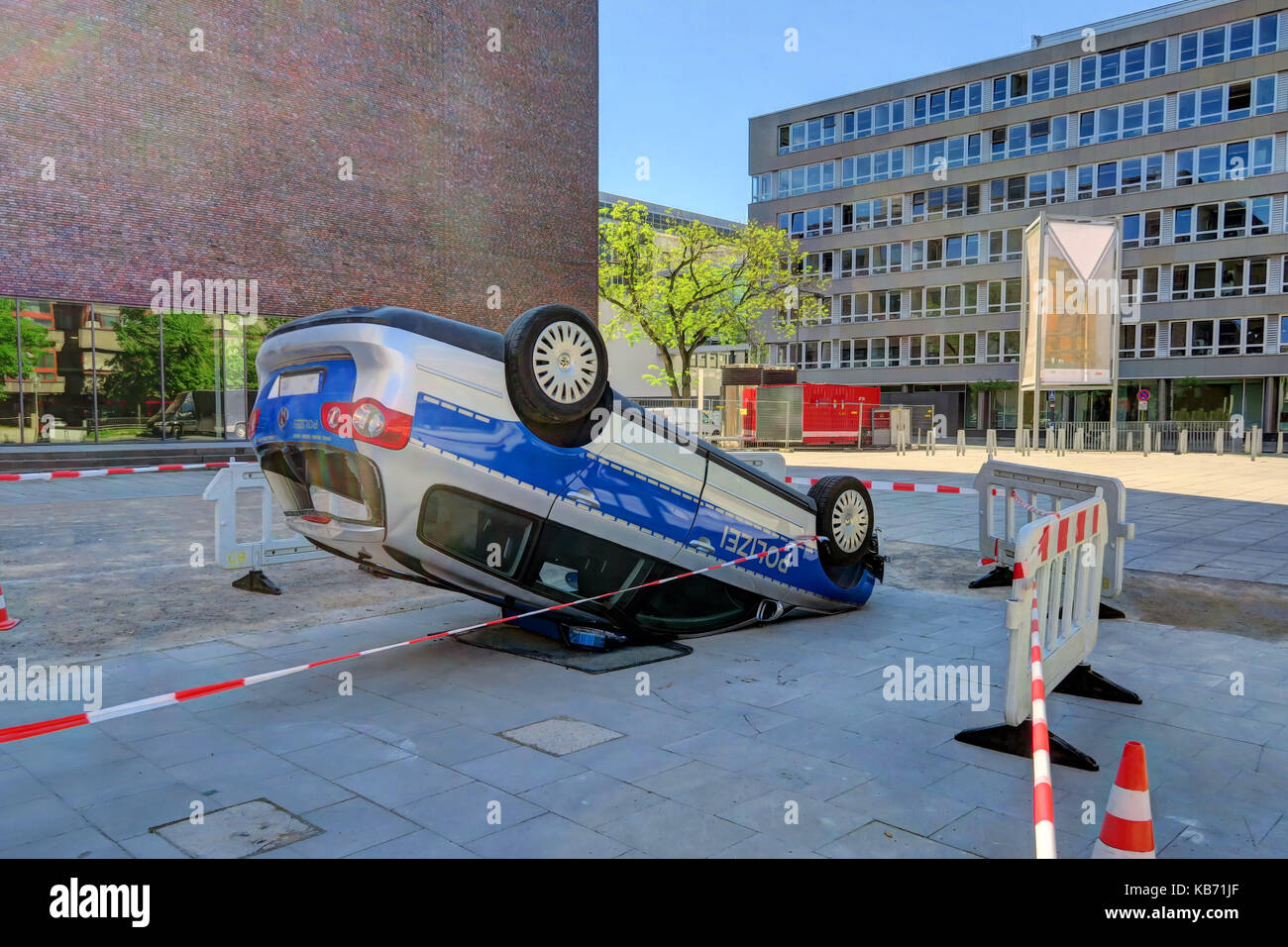 A police car is turned upside down in an car accident or art exhibition ...