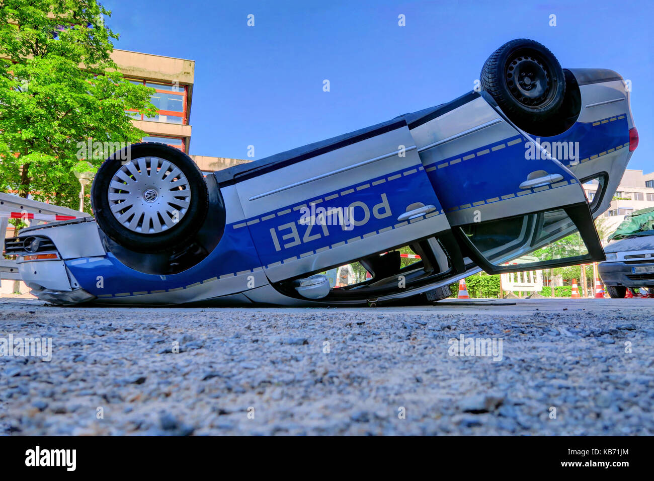 A police car is turned upside down in an car accident or art exhibition ...