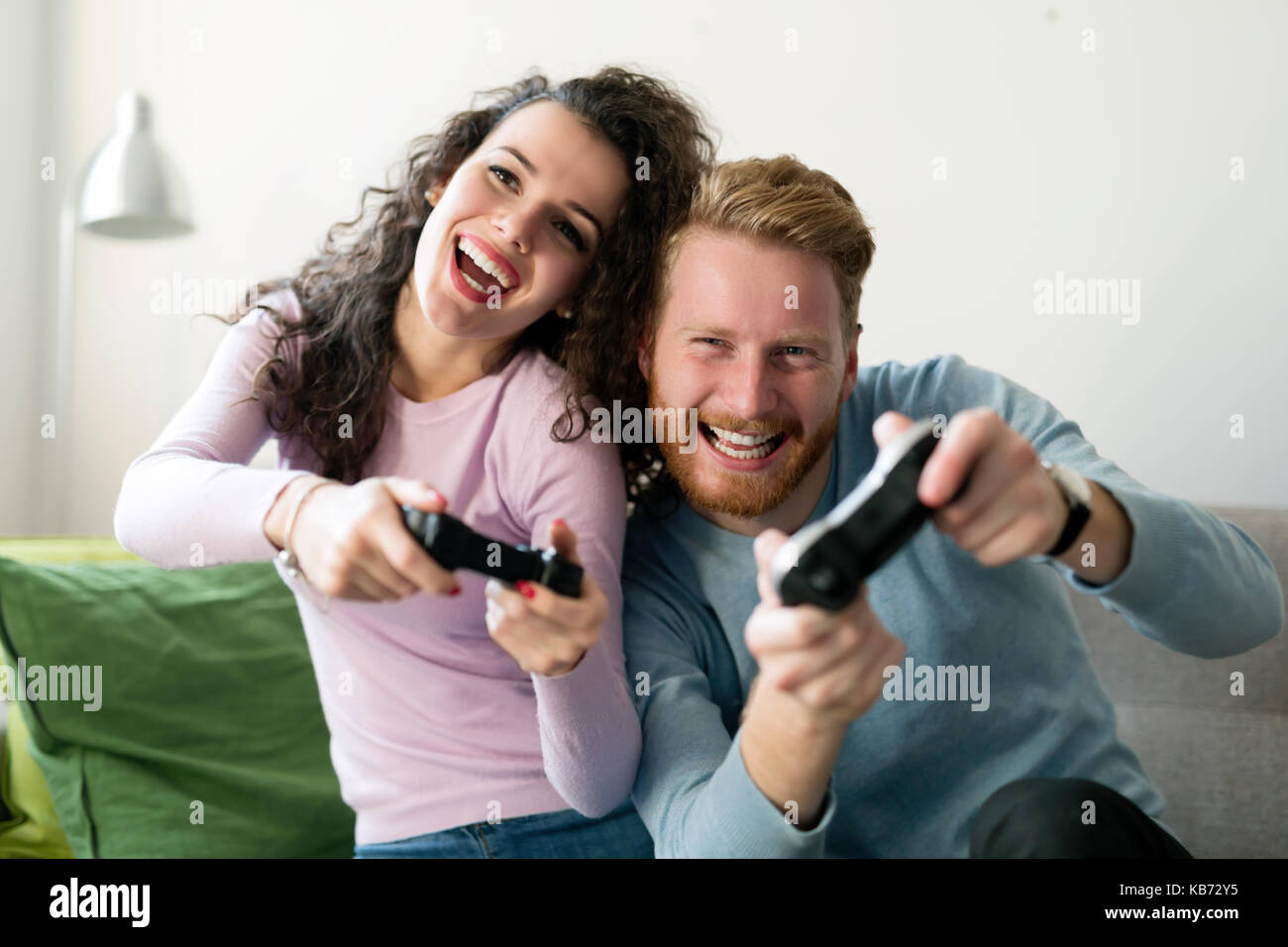 Premium Photo  Excited gamers friends playing video games at home