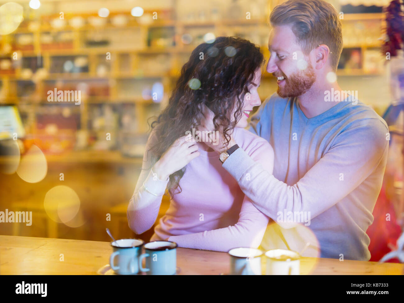 Romantic couple having date in coffee shop Stock Photo