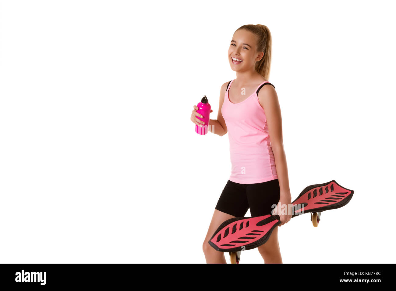 huilen Antibiotica ziekte Cheerful sporty teen girl holding waveboard and bottle of water,isolated on  white background with copyspace,studio shot Stock Photo - Alamy